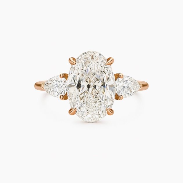 The Medici Lucia Oval & Pear Side Stone Ring